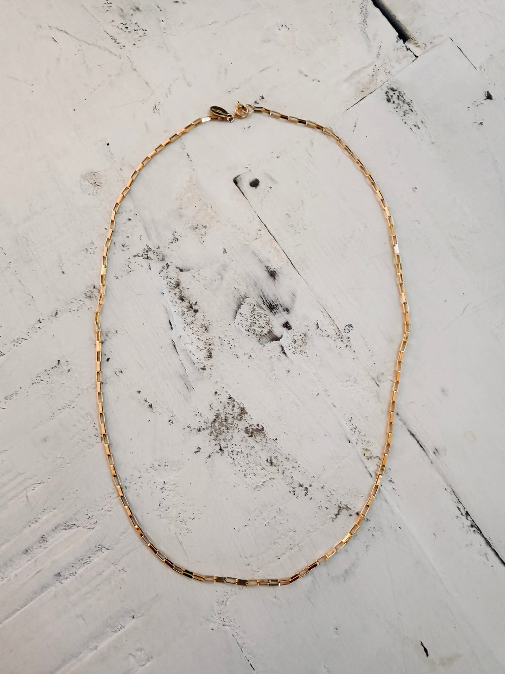 the birdie necklace.