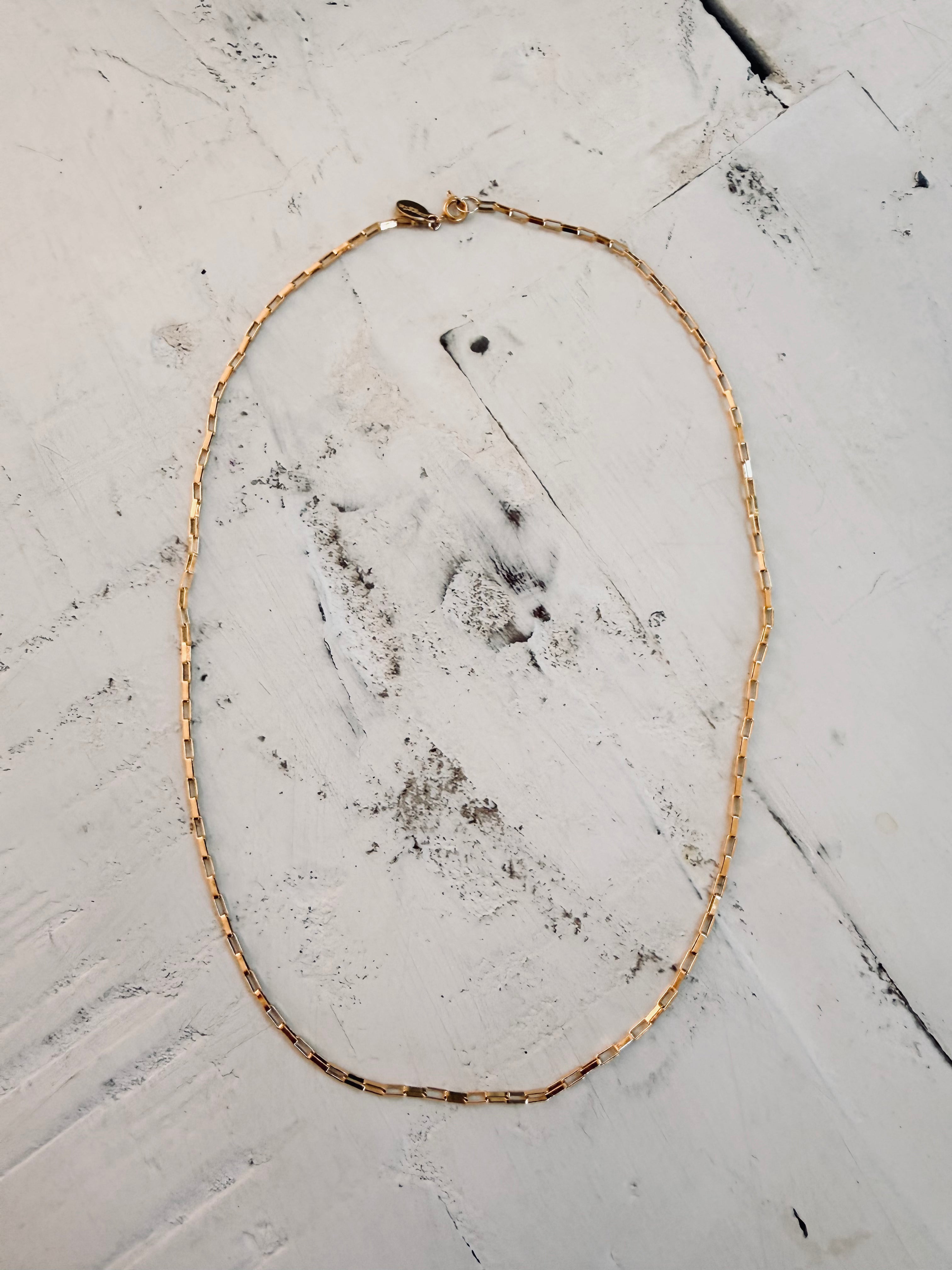the birdie necklace.